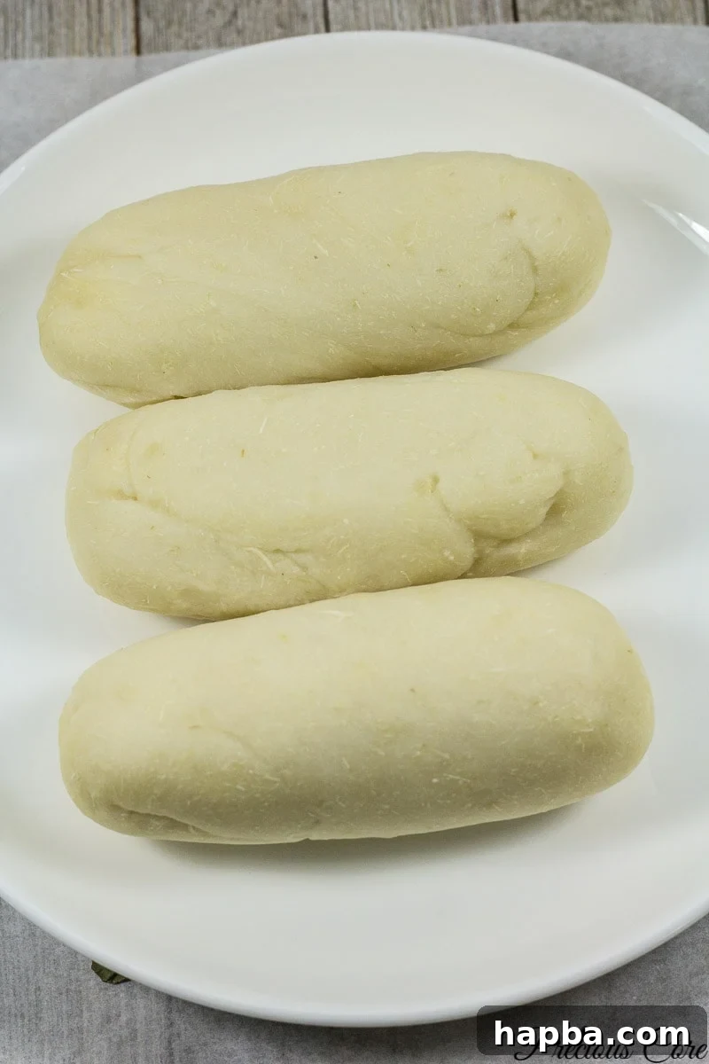 A step-by-step image showcasing the preparation of Water Fufu, illustrating a crucial stage in its transformation from fermented cassava paste.