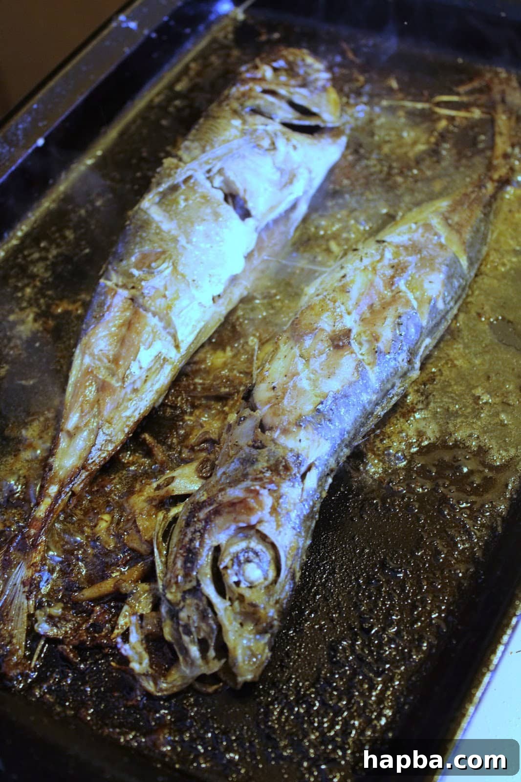 Cooked Cameroonian Roasted Fish on a pan