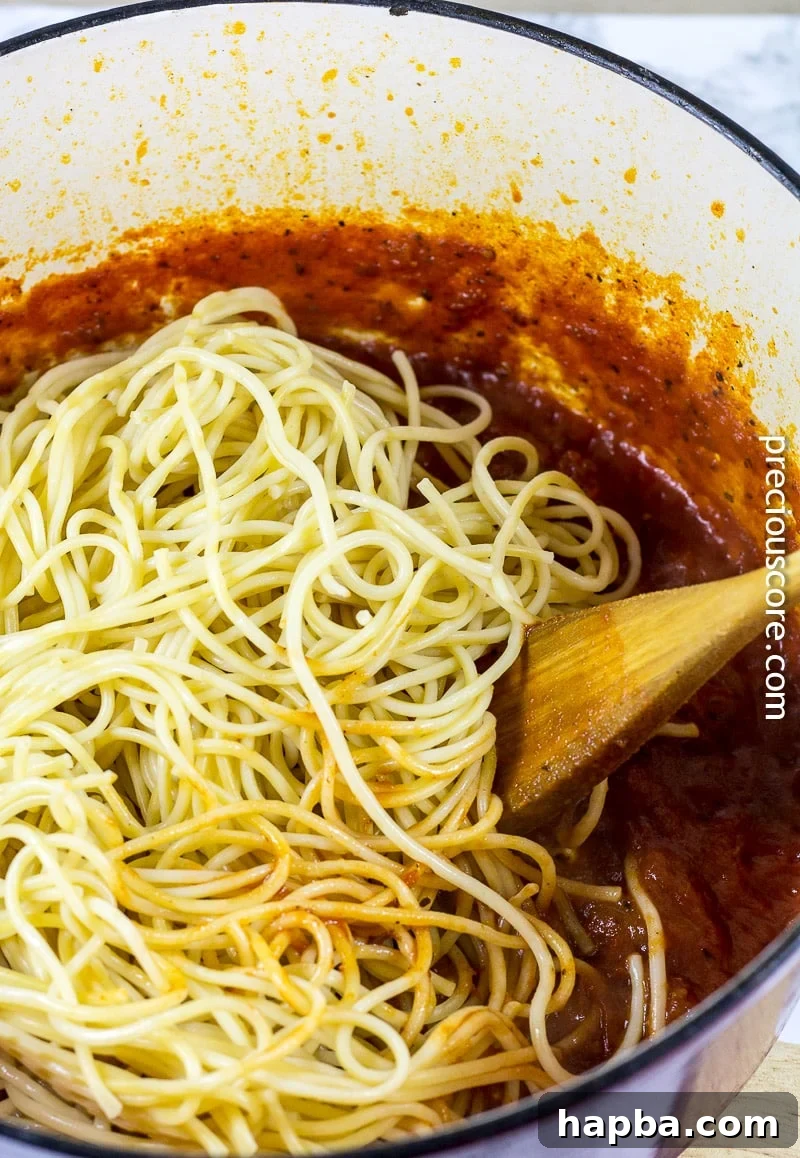 Steps showing the simple tomato sauce being prepared and then combined with boiled pasta for blackened shrimp pasta.