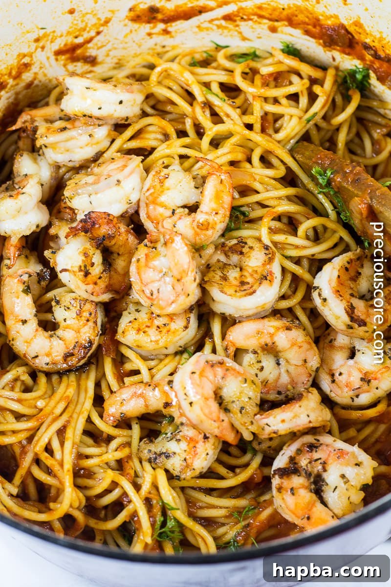 Blackened Shrimp and Pasta recipe plated beautifully, showcasing a hearty and flavorful dinner.
