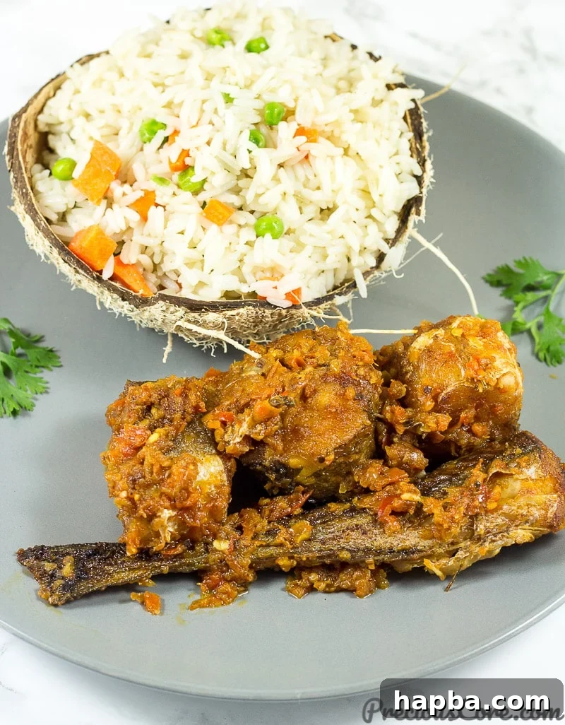Foolproof Coconut Rice 7 Coconut rice served with peppered fish