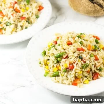 White bowls of coconut fried rice.