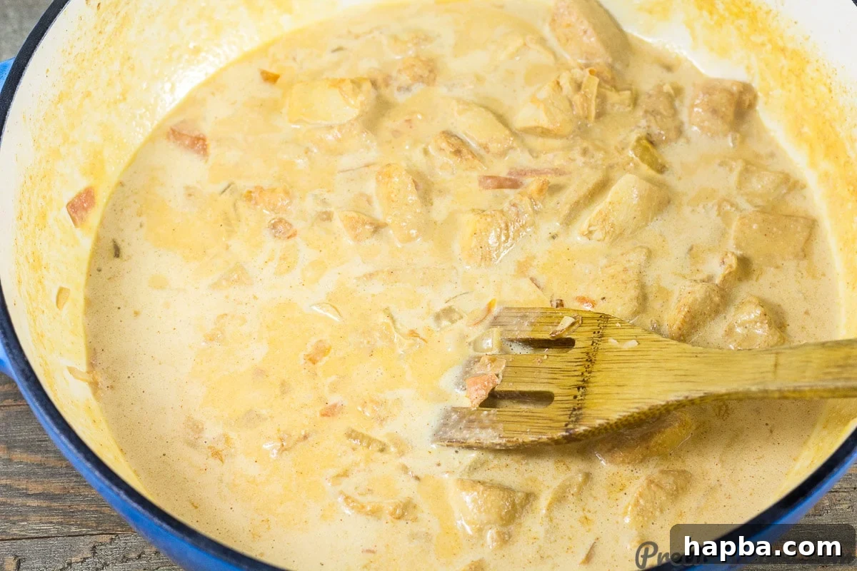 Season the Creamy Sauce with Salt, Pepper, and Paprika