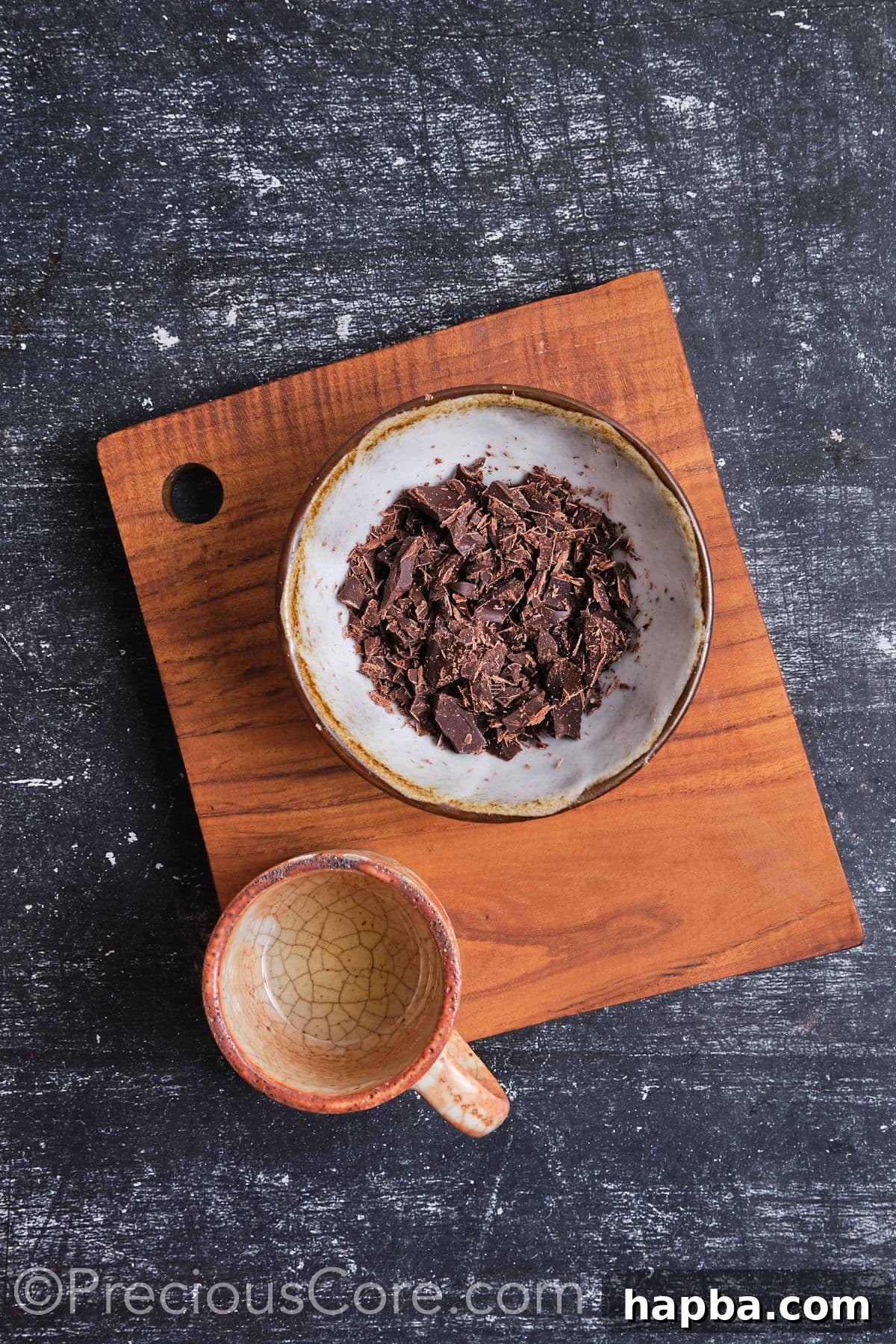 Grated chocolate ready to be melted for the chocolate frosting.