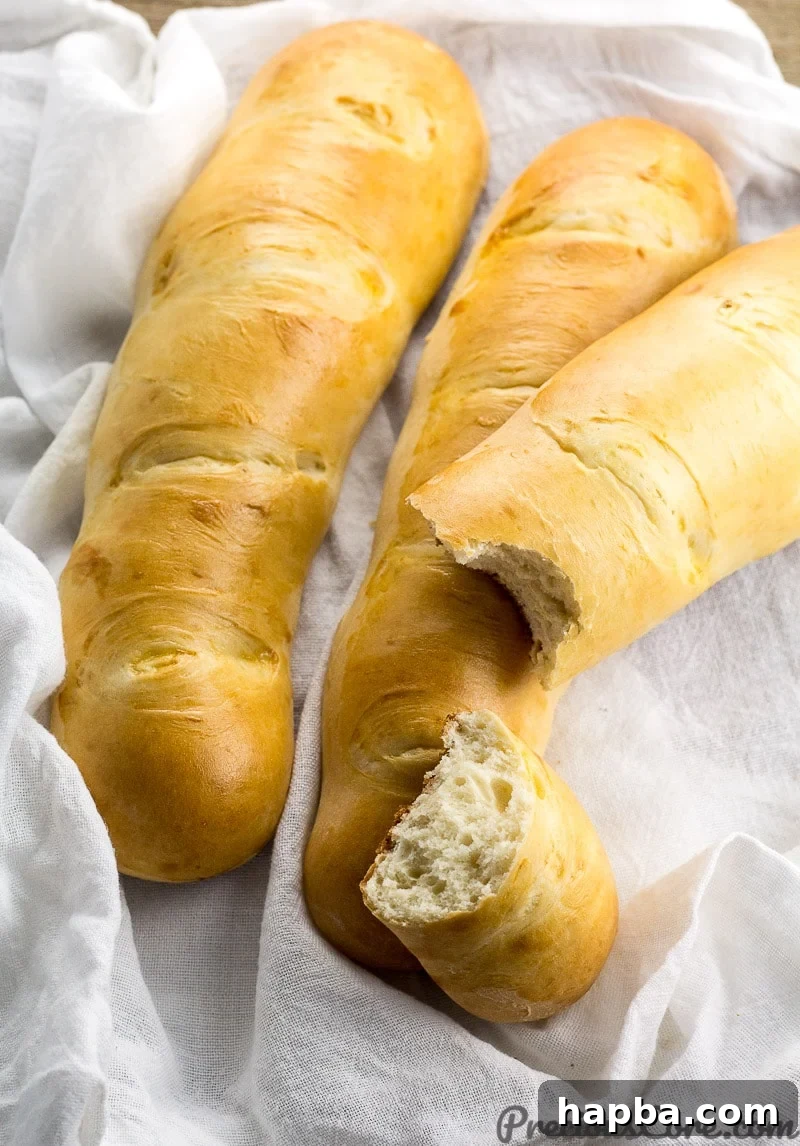 Homemade Milk Bread - The Best Homemade Bread Recipe, ready to be sliced and served.