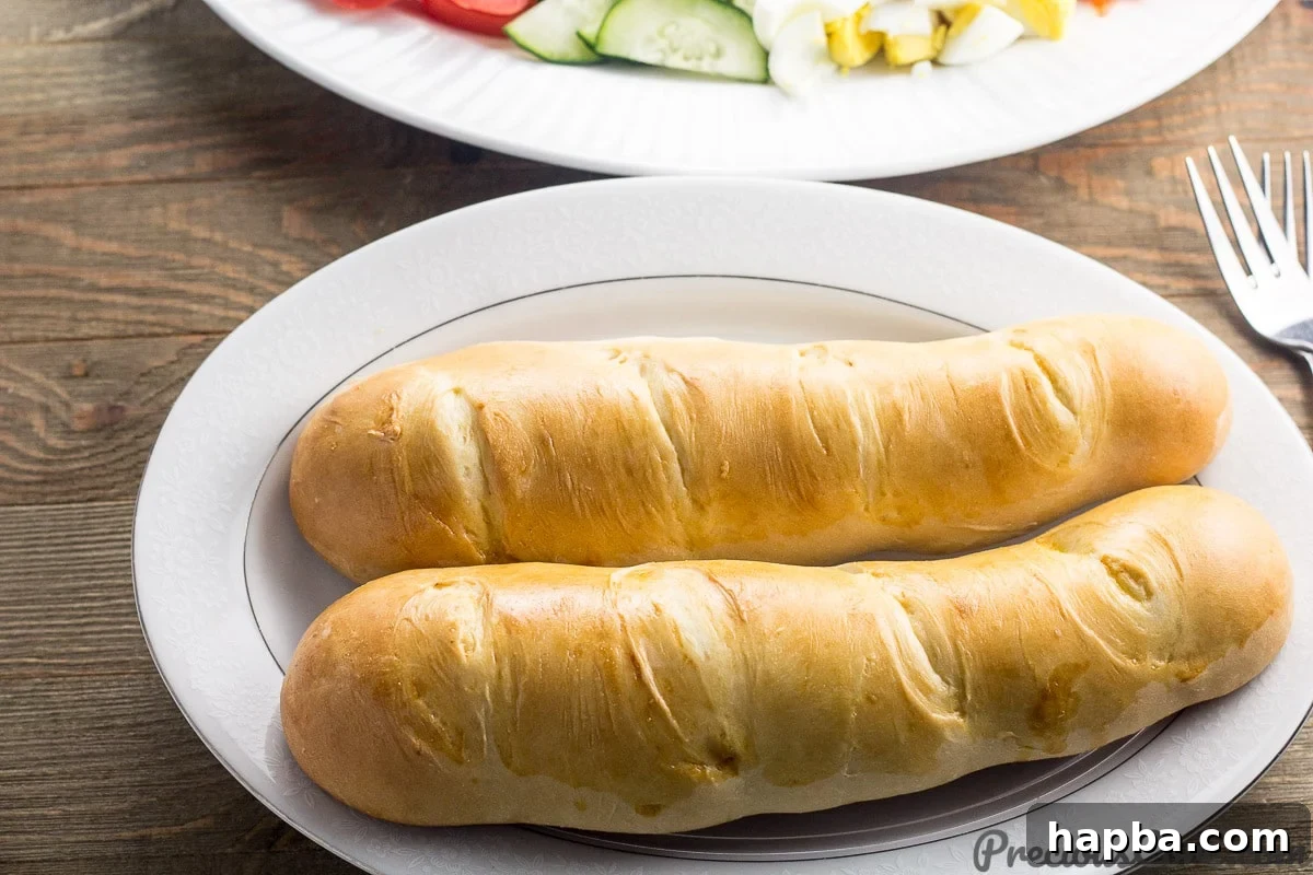 Homemade Milk Bread served elegantly with a vibrant, fresh salad, highlighting its versatility.