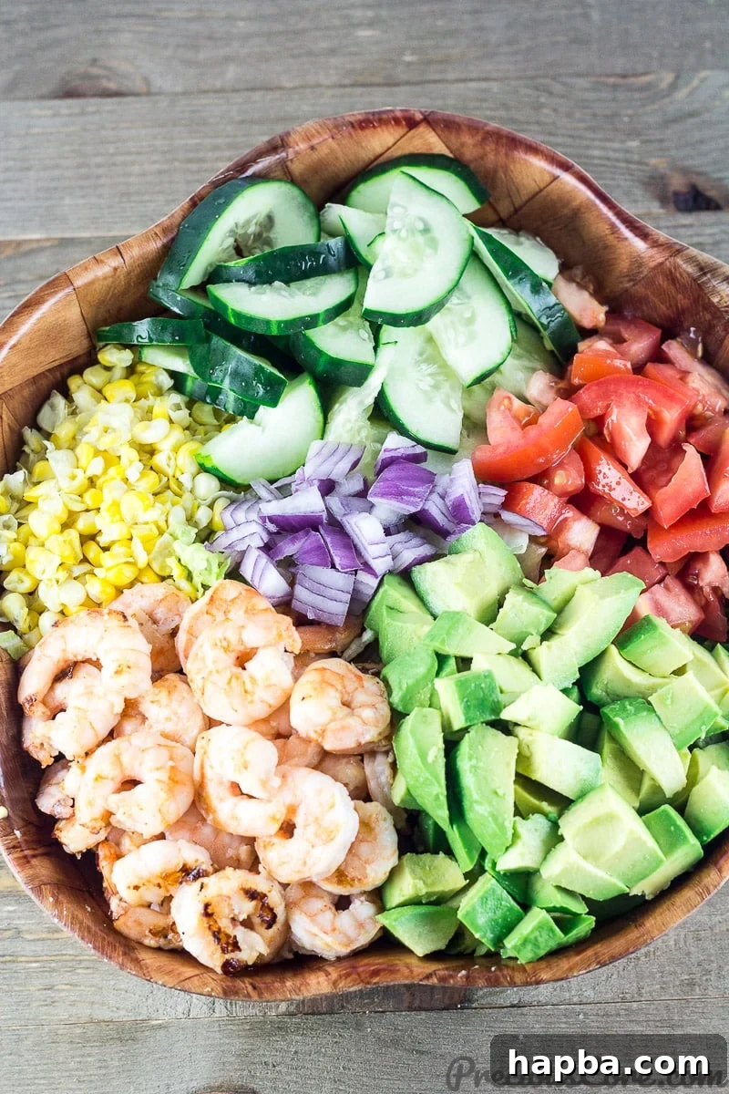 Vibrant Shrimp Avocado Medley 3 Shrimp Avocado Salad bowl, showcasing the fresh ingredients mixed together.
