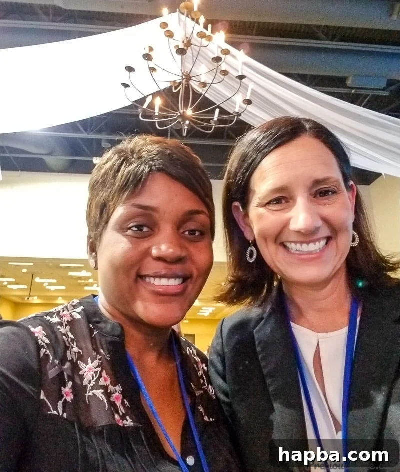Precious Core pictured with Beth Le Manach of Entertaining with Beth, exchanging insights at the food blogger conference