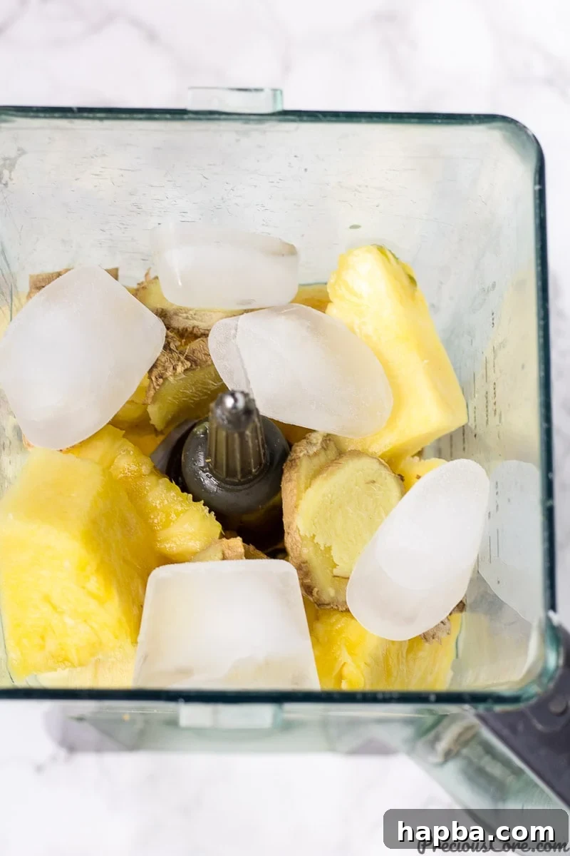 Sunshine Spice Blend 4 Pineapple Ginger Juice ingredients in blender