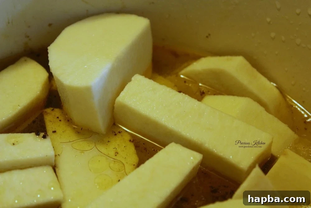Yam pieces in a pot with water