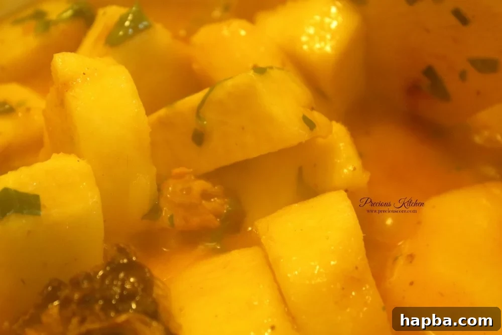 Yam porridge with fresh spinach added