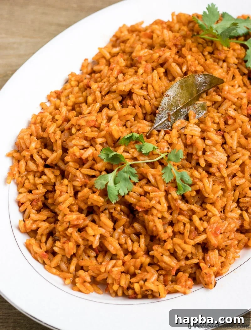A close-up of Nigerian Jollof Rice showing its rich texture and color.