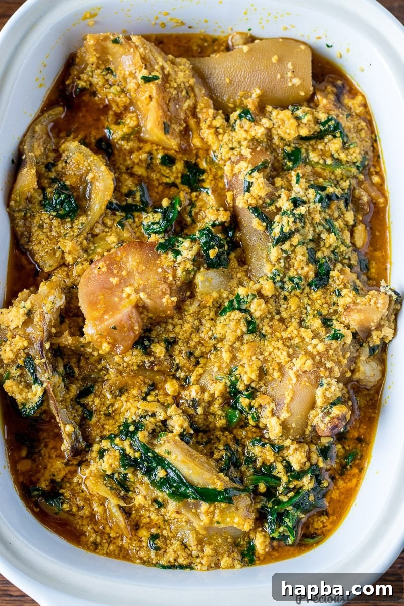 Melon Seed Magic 4 Close-up shot of egusi soup in a bowl, showing its rich texture and color.