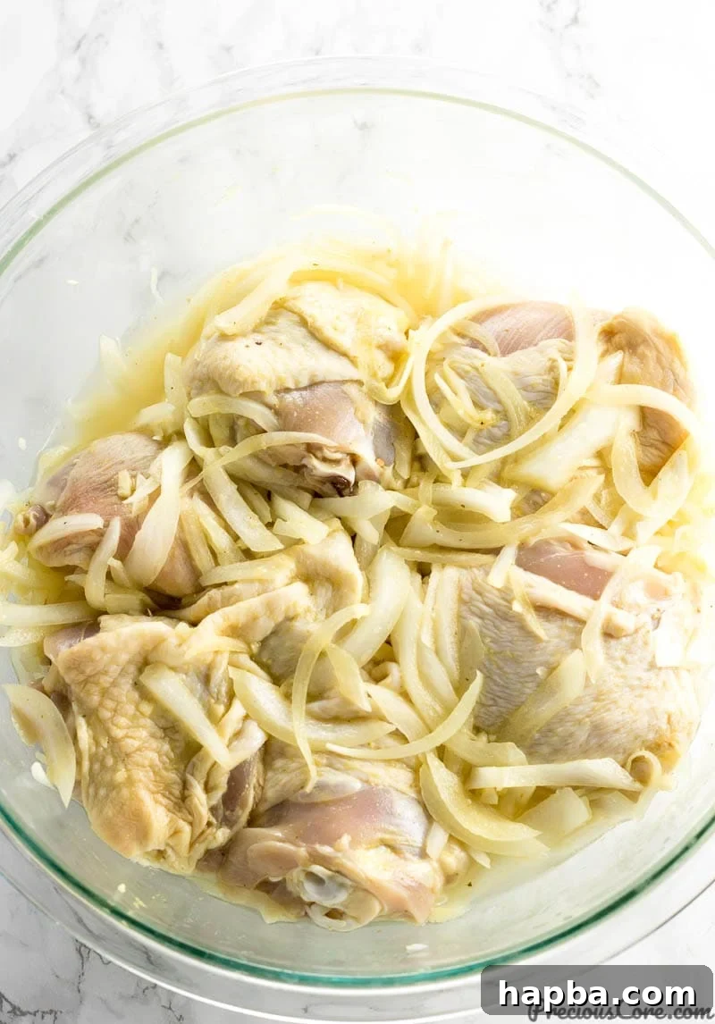 Marinating chicken for Chicken Yassa