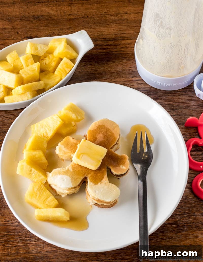 Kids making fluffy pancakes with fun Whiskware molds