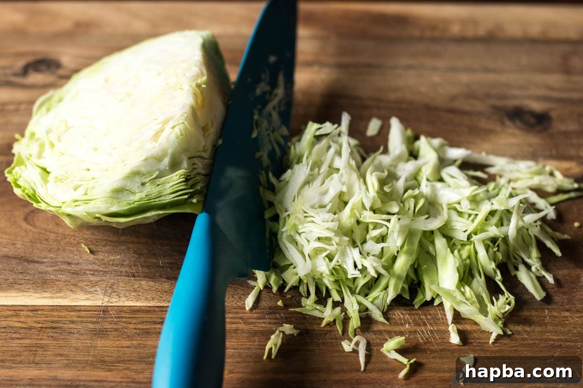 Refreshing Cabbage Slaw 5 A visual guide on how to perfectly chop or shred cabbage for the salad.