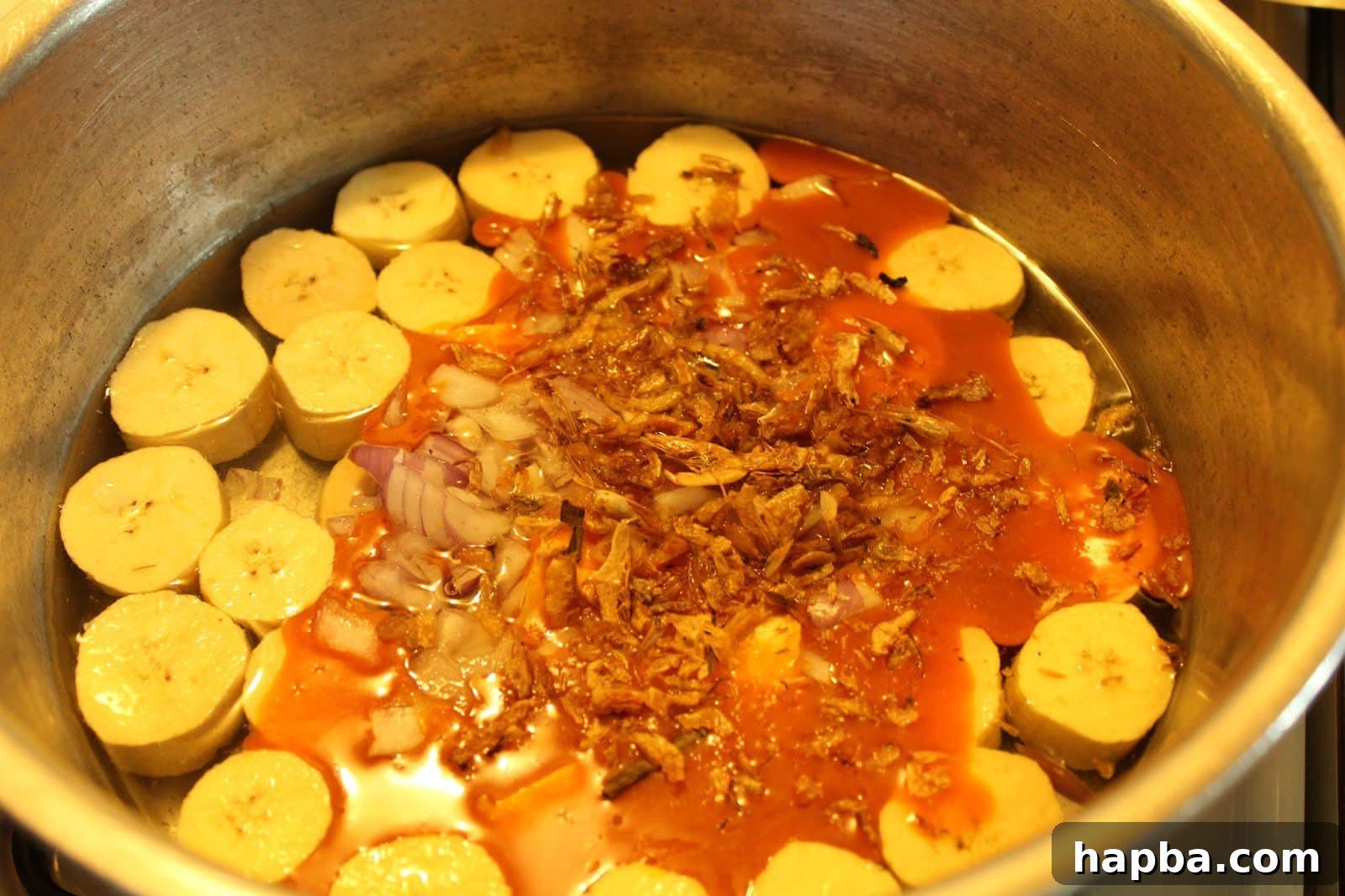 Adding Palm Oil, Onions, and Crayfish