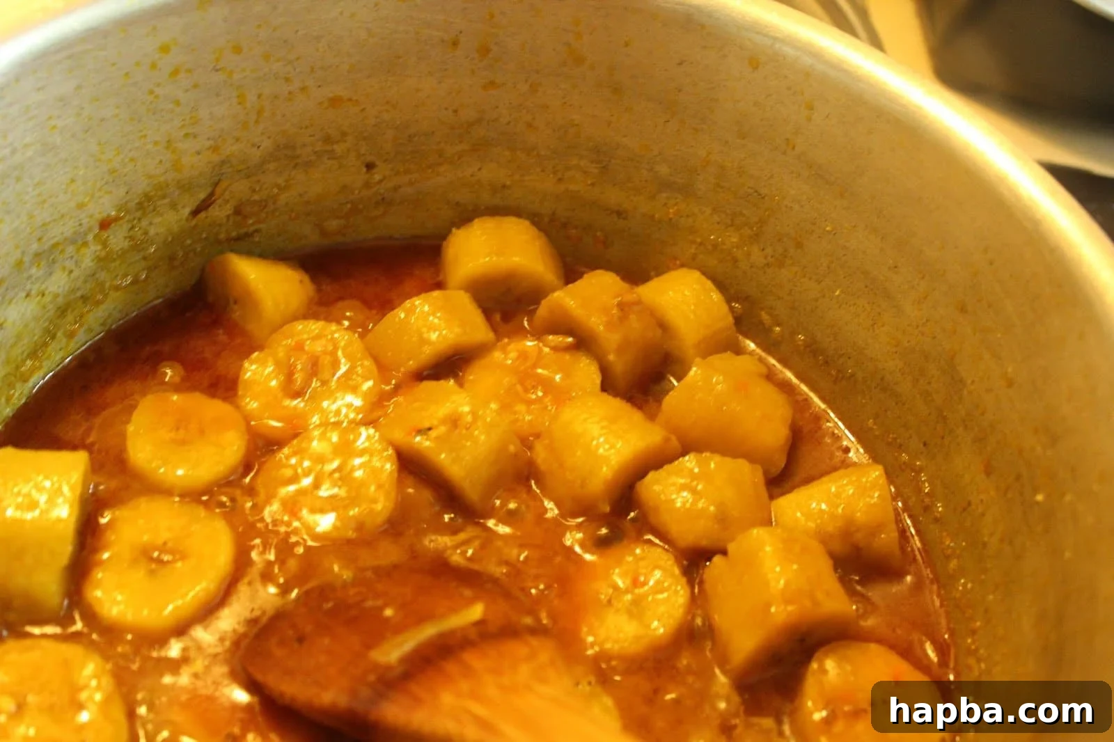 Plantains Simmering with Sauce