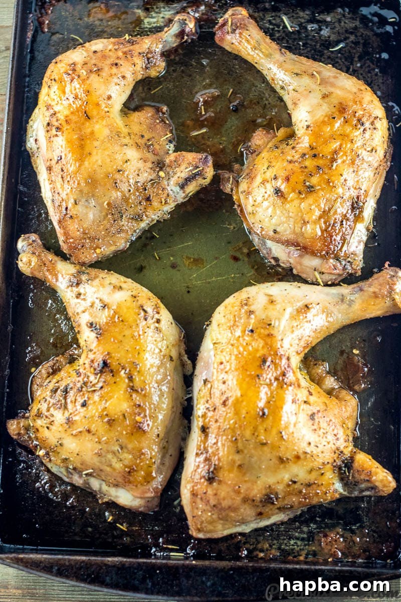Baked Chicken on a tray with liquid oozing out