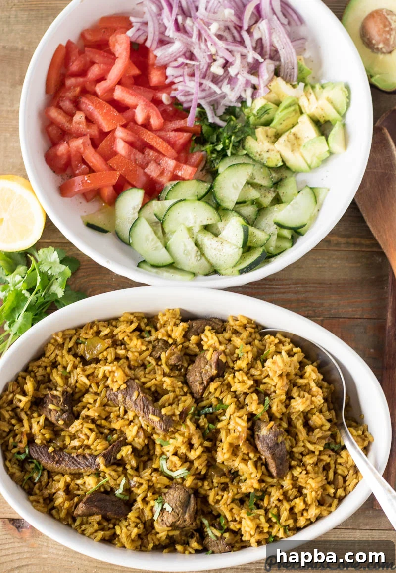 A beautifully presented bowl of Beef Pilau, showcasing fluffy spiced rice and tender beef chunks, served with a fresh side salad.