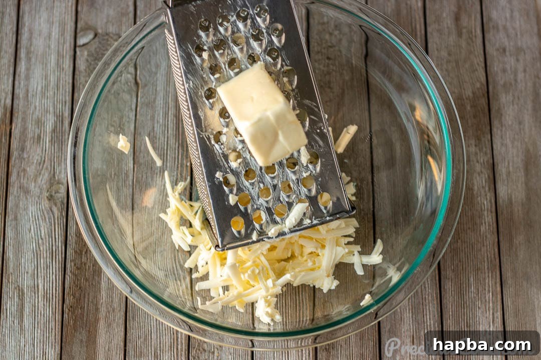 Perfectly Flaky Homemade Buttermilk Biscuits 5 Grated butter in mixing bowl
