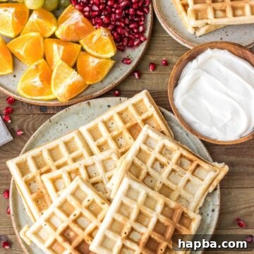 Waffle Perfection from Your Kitchen 5 Homemade Waffles on a plate with whipped cream on the side