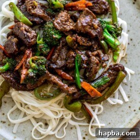 Beef stir fry over noodles