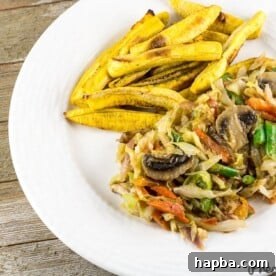 Cameroonian Cabbage Stew served with baked plantain fries.