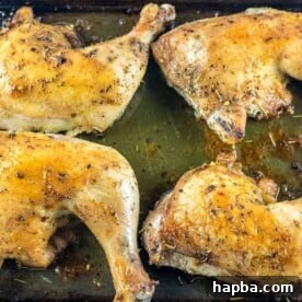 Baked Chicken Leg Quarters on baking tray