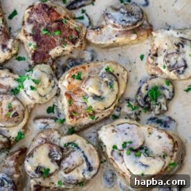Cooked pork tenderloin in a creamy sauce with mushrooms.