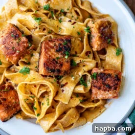 Plated Cajun Pasta With Salmon.