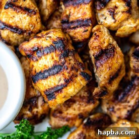 Chicken nuggets with grill marks.