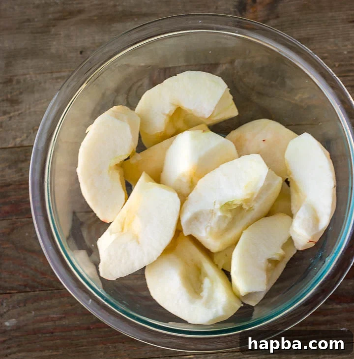 Golden Caramel Apple Tart 7 Bowl of peeled apples