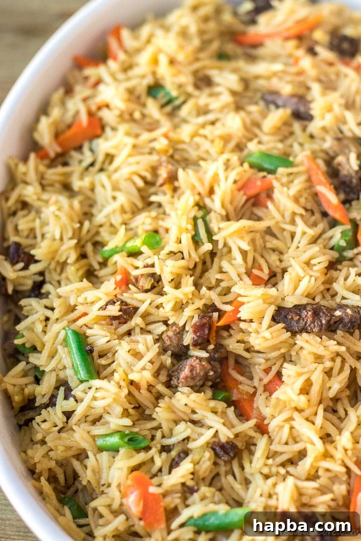 A close-up view of the rich, savory texture of Beef Fried Rice.